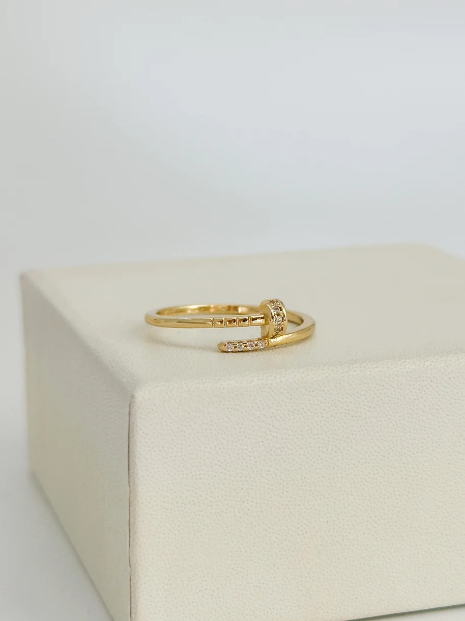 anillo clavo con circones blancos