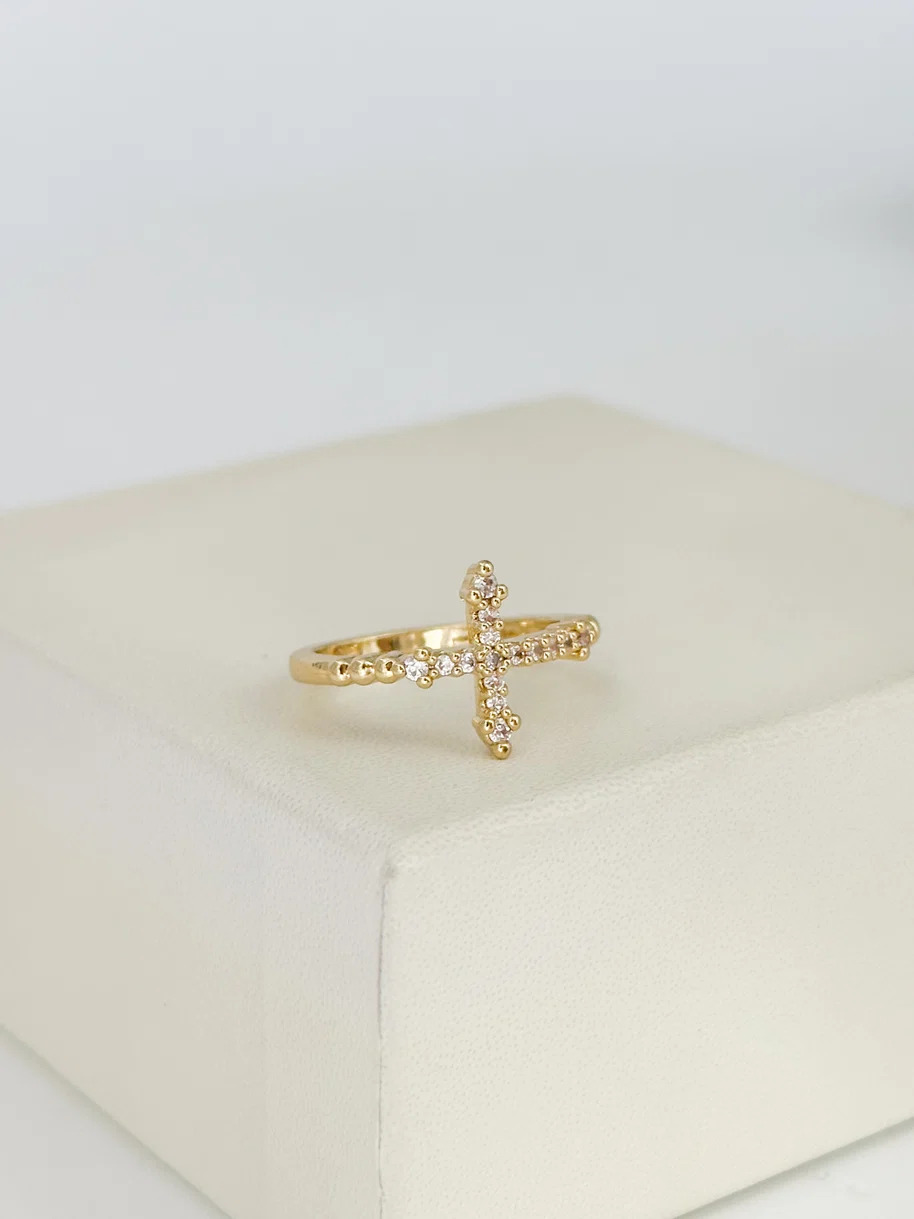 Anillo cruz circones blancos